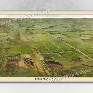 May include: An aerial view of the town of Depew, New York, circa 1900. The image shows a bird's eye view of the town, with a large industrial complex in the center. The surrounding area is mostly farmland, with some houses and businesses scattered throughout.