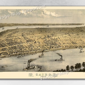 May include: An antique map of Cairo, Illinois, showing the city's layout and surrounding waterways. The map is printed in shades of brown and blue, with a detailed depiction of the city's streets, buildings, and riverfront. The title "Cairo, Illinois" is prominently displayed at the bottom of the map.