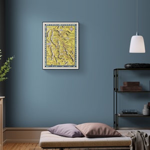 May include: A vintage map of the Yosemite Valley, California, with a yellow background and blue and black details. The map shows the location of various landmarks, including Yosemite Falls, Half Dome, and El Capitan. The text "Yosemite Valley" is printed in a blue banner at the top of the map.
