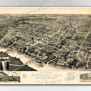 May include: A vintage black and white aerial view map of Gadsden, Alabama, showing the city's layout and surrounding landscape. The map is titled "Perspective Map of the City Gadsden, Ala. County Seat of Etowah County 1887."