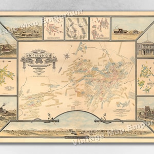 May include: An antique map of the Tombstone Mining District in Arizona, showing the location of mines and other points of interest. The map is printed in black, red, blue, and yellow on a cream-colored background. The map is titled "Map of the Tombstone Mining District, Arizona."