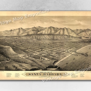May include: A vintage bird's eye view map of Santa Barbara, California, 1875. The map shows the city's layout with streets, buildings, and the coastline. The Santa Ynez Mountains are in the background.
