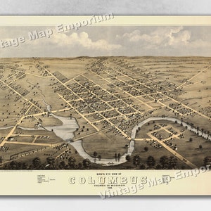 May include: An antique bird's eye view map of Columbus, Columbia Co., Wisconsin. The map shows the city's streets, buildings, and river. The map is printed in black and white and has a vintage aesthetic.
