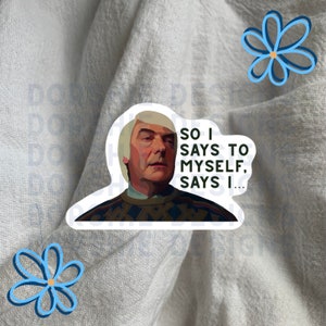 May include: A sticker featuring a cartoon illustration of a man with white hair and a mustache. The man is wearing a patterned sweater and has a serious expression on his face. The text "So I says to myself, says I..." is written in black text on a white background.