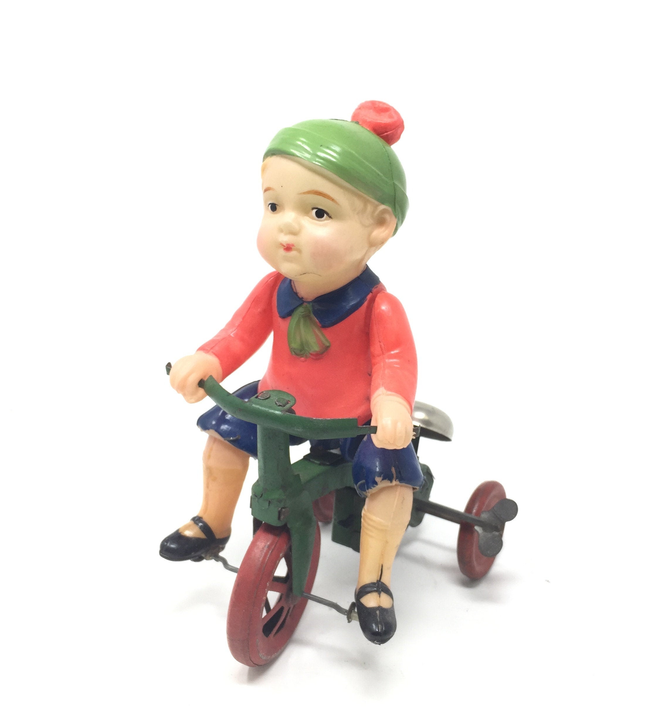 boy on tricycle