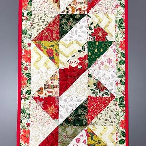 May include: A set of three ceramic mugs with a speckled, matte finish in cream, light grey, and dark grey. Each mug has a simple, minimalist design and a rounded handle.