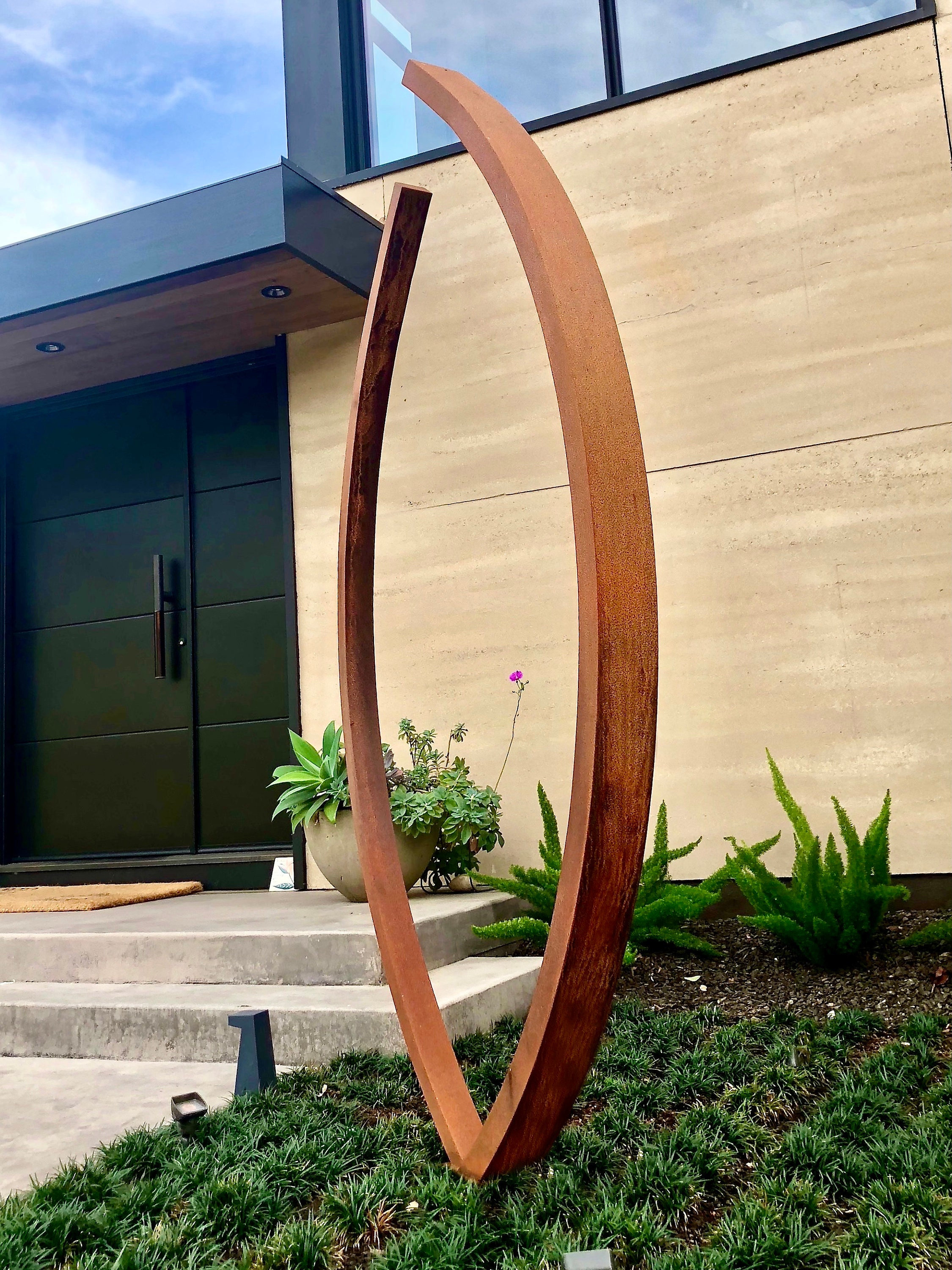 Modern Outdoor Sculpture "EMBRACE"  weathered steel