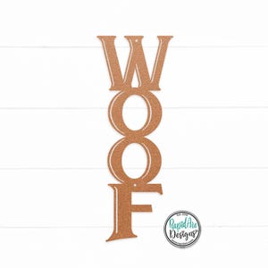May include: A copper-colored metal sign with the word "WOOF" spelled out vertically. The letters are in a vintage style font.