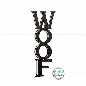 May include: Black metal sign with the word "WOOF" in large, stylized letters. The letters are stacked vertically, with the "W" at the top and the "F" at the bottom. The sign is designed to be hung on a wall or door.