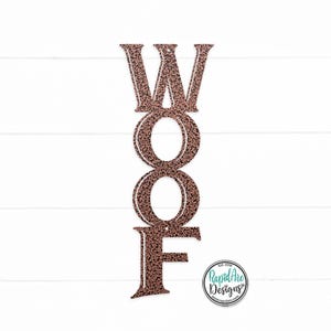 May include: A copper-colored metal sign with the word "WOOF" in vertical letters. The letters have a textured, hammered metal finish.