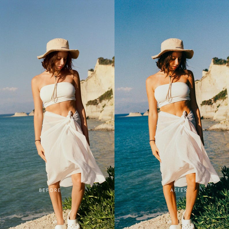May include: A woman wearing a white bandeau top and a white sarong skirt. She is standing on a beach with a blue sky and water in the background. She is wearing a straw hat and has her hair pulled back.