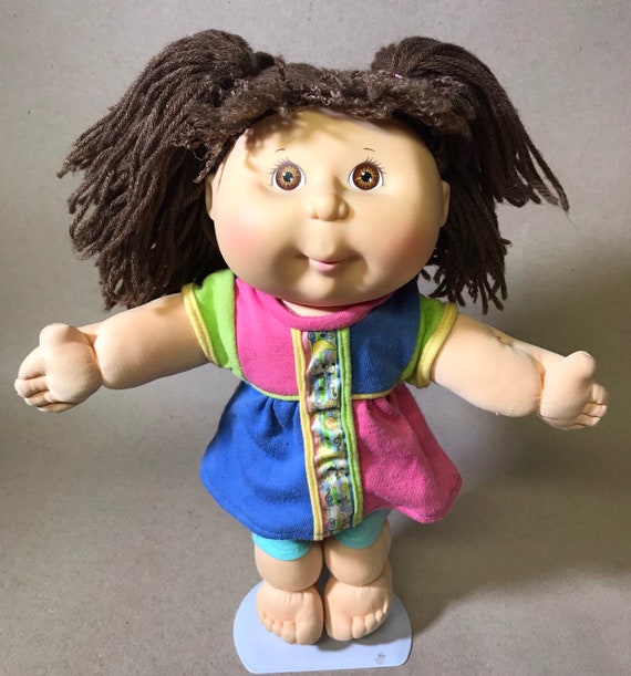 dark haired cabbage patch doll