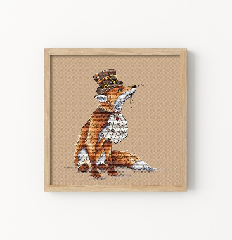 May include: A framed cross-stitch embroidery of a fox wearing a brown top hat with gears and a white ruffled collar. The fox is sitting on a beige background.