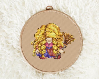 May include: A cross-stitch embroidery hoop with a whimsical illustration of a witch with long blonde hair and a broom. The witch is wearing a purple and red dress and brown shoes.