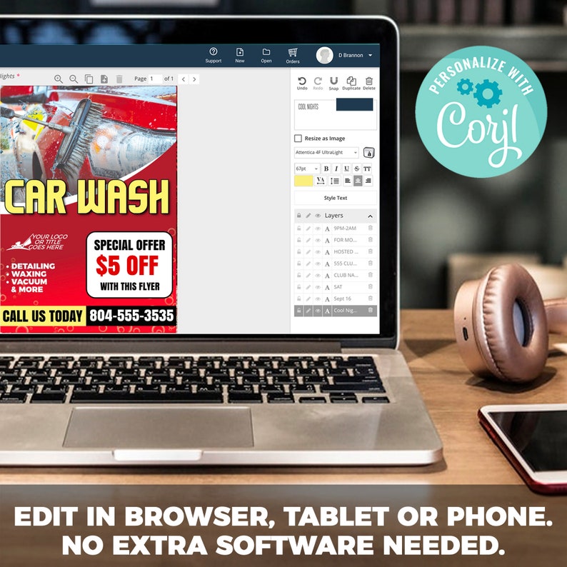May include: A laptop computer screen displaying a car wash flyer with the text "CAR WASH" and "SPECIAL OFFER &pound;5 OFF". The flyer is on a blue background with white text. The laptop is on a wooden table with a phone and headphones.