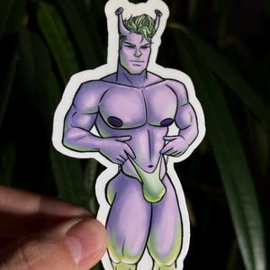 May include: A sticker of a purple alien with green hair and antennae wearing a green and purple thong. The alien is standing with its hands on its hips.