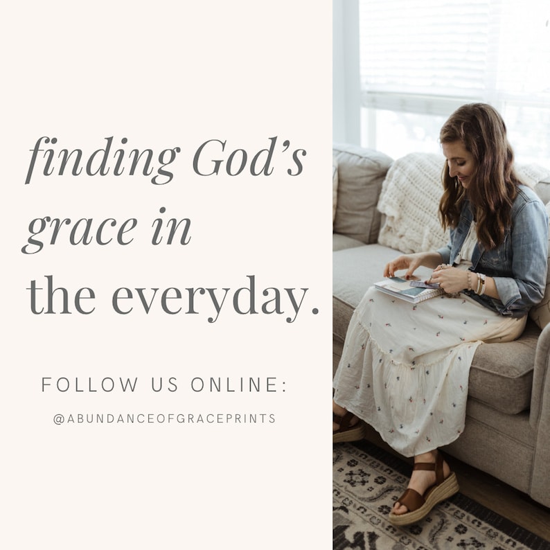 May include: A woman sits on a couch in a white dress and denim jacket, reading a book. The text "finding God's grace in the everyday." is displayed on the left side of the image. The text "FOLLOW US ONLINE: @ABUNDANCEOFGRACEPRINTS" is displayed below the main text.
