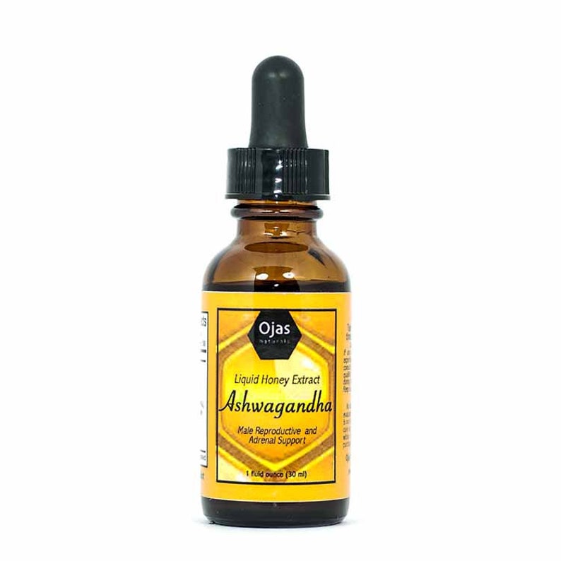 May include: A brown glass bottle with a dropper top containing a liquid honey extract of Ashwagandha. The bottle label is yellow with a honeycomb design and the text "Ojas Naturals Liquid Honey Extract Ashwagandha Male Reproductive and Adrenal Support 1 fluid ounce (30 ml)"