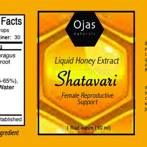 K&ouml;nnte beinhalten: Ein gelbes Etikett mit einem Wabenmuster und dem Text "Ojas Naturals" und "Fl&uuml;ssiger Honig-Extrakt Shatavari Unterst&uuml;tzung der weiblichen Fortpflanzung". Das Etikett enth&auml;lt auch den Text "1 Fl&uuml;ssigunze (30 ml)". Das Etikett befindet sich auf einem gelben Hintergrund.