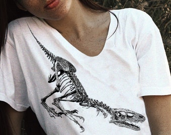 Dinosaur shirt. Velociraptor Tee. Dino Jump. Womens Off Shoulder Slouchy Top Also in Unisex Buy any 2 and get a 3rd Tee FREE! Choose Colors!