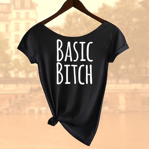 Camisa básica de perra. Top holgado con hombros descubiertos para mujer. También en Unisex. ¡¡Compra 2 camisetas o tops y llévate una tercera camiseta GRATIS!!