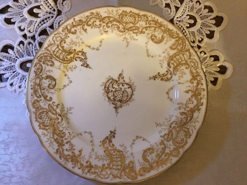 Two Gold Trimmed 9