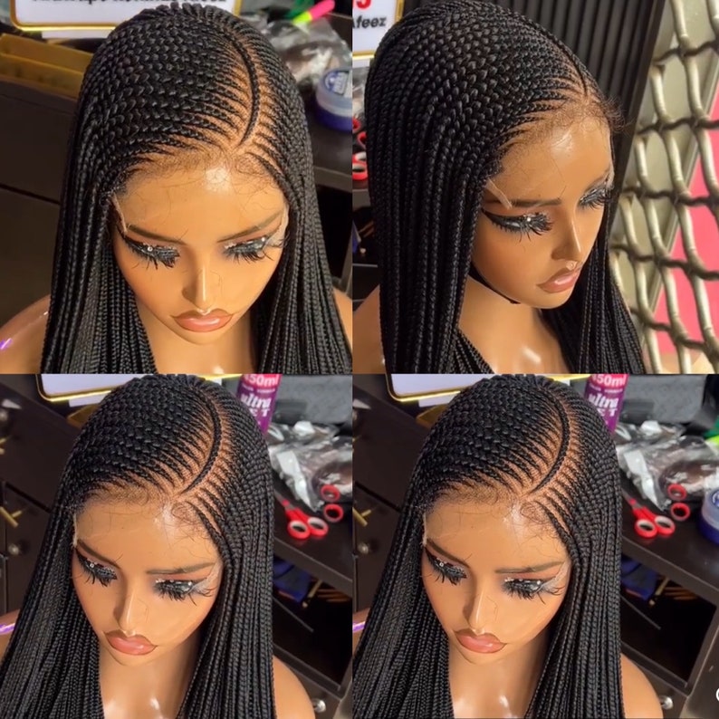May include: A black braided wig with a lace front. The wig is styled in a straight, long style. The wig is on a mannequin head.