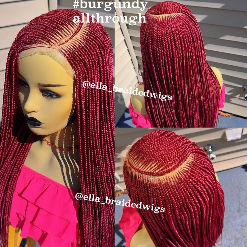 May include: A burgundy braided wig with a lace front. The wig is styled in a long, straight style. The wig is shown on a mannequin head. The text #burgundy allthrough and @ella_braidedwigs is visible in the image.