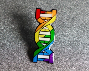 May include: Rainbow colored enamel pin shaped like a DNA double helix.