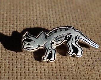 Triceratops dinosaur skeleton pin