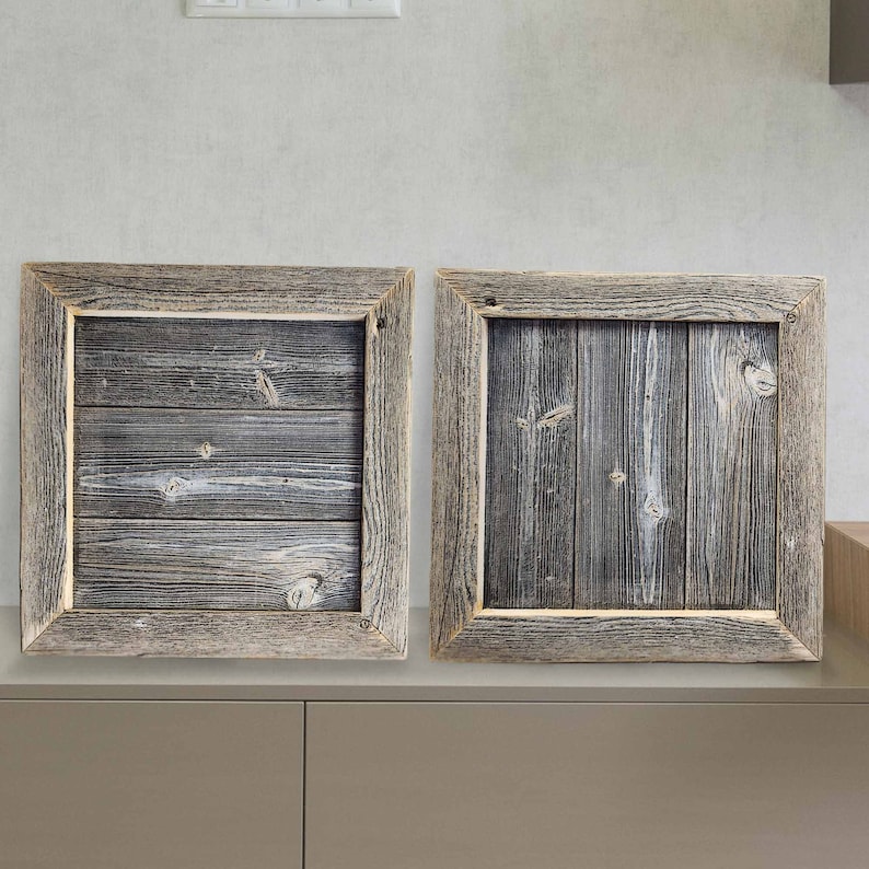 May include: Two square wooden frames with a rustic, weathered gray finish. The frames are made of reclaimed wood and have a natural, distressed look.