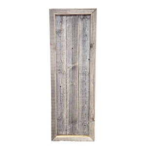 May include: A rustic wooden frame with a weathered gray finish. The frame is made of reclaimed wood and has a natural, distressed look.