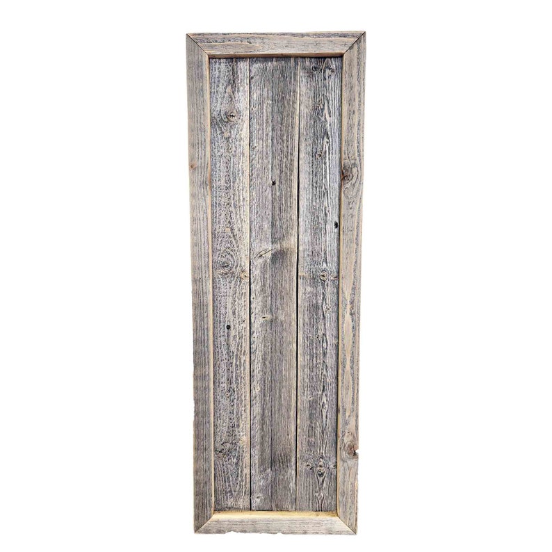 May include: A rustic wooden frame with a weathered gray finish. The frame is made of reclaimed wood and has a natural, distressed look.
