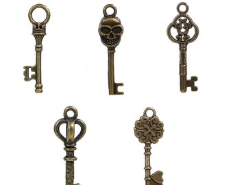 May include: Five antique-style skeleton keys with ornate designs. The keys are made of metal and have a bronze finish.