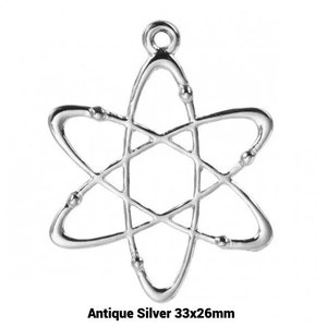 May include: Antique silver atom charm pendant, measuring 33x26mm. The charm is a detailed, openwork design of an atom with a loop at the top for hanging.