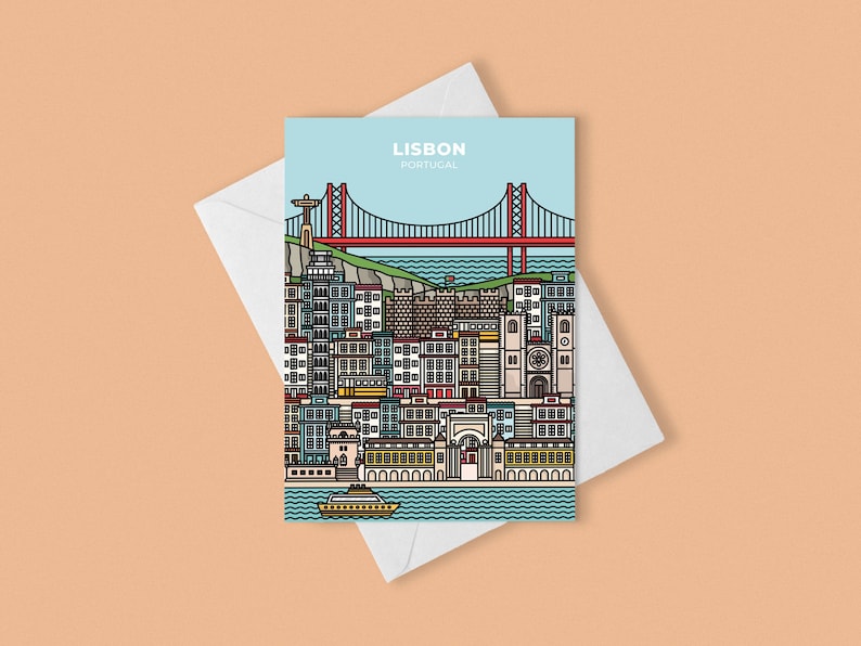 May include: A postcard featuring a stylized illustration of Lisbon, Portugal. The design includes a red bridge, buildings, and a boat on the water. The text "LISBON PORTUGAL" is at the top. The postcard is on a white envelope.