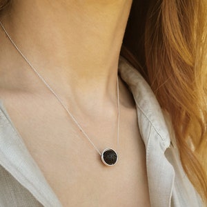 Aromatherapy necklace

Just drop a few drops of essential oil on the lava rock.

 The Lava stone emerges a great aroma that is so lovely.
 This lava rock pendant necklace is crafted exclusively by solid sterling silver 925 and natural lava stone.