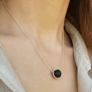 Aromatherapy necklace

Just drop a few drops of essential oil on the lava rock.

 The Lava stone emerges a great aroma that is so lovely.
 This lava rock pendant necklace is crafted exclusively by solid sterling silver 925 and natural lava stone.