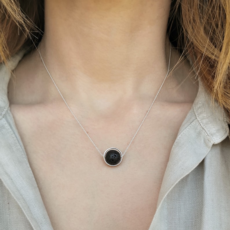 Aromatherapy necklace

Just drop a few drops of essential oil on the lava rock.

 The Lava stone emerges a great aroma that is so lovely.
 This lava rock pendant necklace is crafted exclusively by solid sterling silver 925 and natural lava stone.