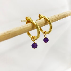 February Birthstone Amethyst Earrings!

You will love these raw amethyst hoops.
These Chunky Gold Hoops, are handmade with Raw amethyst.

Offer these simple hoop earrings as Birthstone Earrings!

925 sterling silver and  24K gold finish