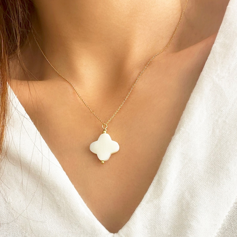 Mother of Pearl White Cross Necklace.

This is a Gemstone White Cross Pendant.

If you love  Religious Jewelry this Dainty cross pendant is a Crucifix necklace you will love!
Sterling silver 925  & mother of pearl gemstone.
Crucifix necklace.