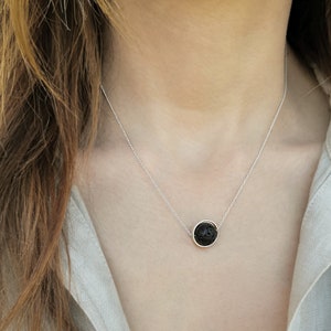 Aromatherapy necklace

Just drop a few drops of essential oil on the lava rock.

 The Lava stone emerges a great aroma that is so lovely.
 This lava rock pendant necklace is crafted exclusively by solid sterling silver 925 and natural lava stone.