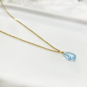Raw Aquamarine Necklace or Aquamarine Choker.
Aquamarine Pendant. 
Dainty Aquamarine teardrop in a Light blue Stone Necklace.
 
925 Sterling silver, Aquamarine  
Great idea for a birthday gift, Pisces gift, or Aries Gift.