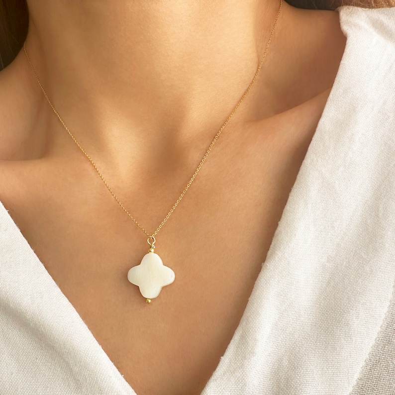 Mother of Pearl White Cross Necklace.

This is a Gemstone White Cross Pendant.

If you love  Religious Jewelry this Dainty cross pendant is a Crucifix necklace you will love!
Sterling silver 925  & mother of pearl gemstone.
Crucifix necklace.