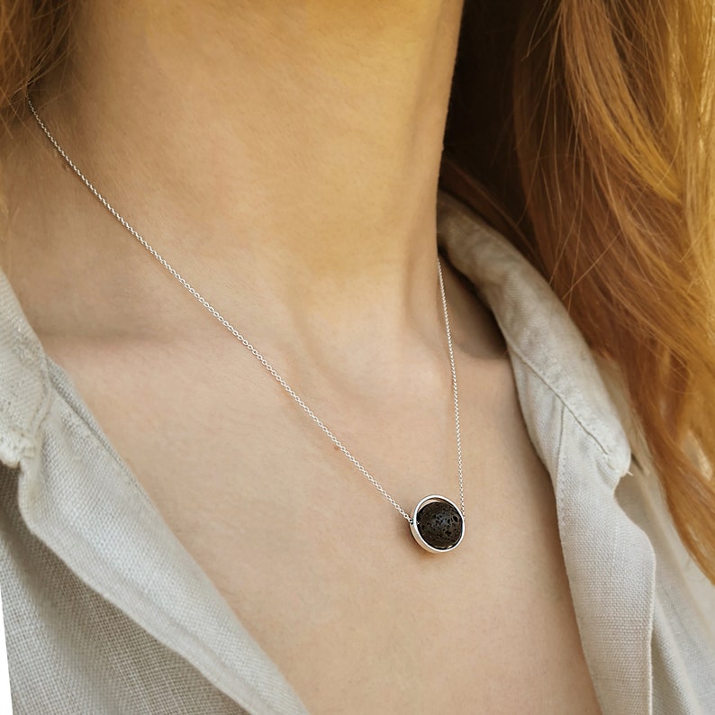 Aromatherapy necklace

Just drop a few drops of essential oil on the lava rock.

 The Lava stone emerges a great aroma that is so lovely.
 This lava rock pendant necklace is crafted exclusively by solid sterling silver 925 and natural lava stone.