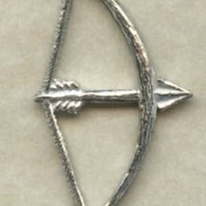 May include: A silver-toned bow and arrow charm, a popular accessory for jewelry making.