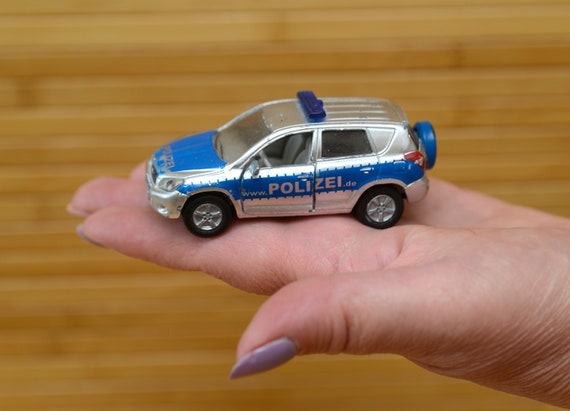 metal toy cars with opening doors