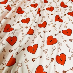 Double Brushed Poly, Heart Lock & Key on Light Pink Base, Polyester Spandex Blend,