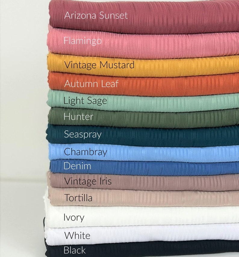 May include: Stack of 14 fabric swatches in various colours, including Arizona Sunset, Flamingo, Vintage Mustard, Autumn Leaf, Light Sage, Hunter, Seaspray, Chambray, Denim, Vintage Iris, Tortilla, Ivory, White, and Black.