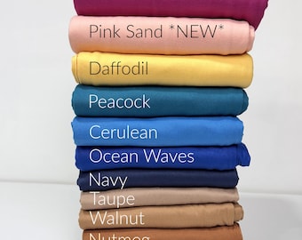 Dubbel geborsteld polymateriaal: 69 kleuren, verschillende soorten vaste stoffen, poly-spandex, 170 gsm